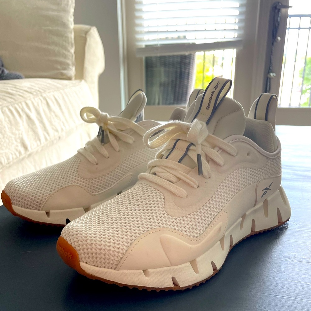 Light cream, super cushioned Reebok zig sneakers. Worn twice